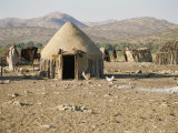 Buy Shelters Made Out of Cow Dung and Sticks by the Himba Tribespeople at AllPosters.com