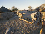 Buy San Bushman Village of Thatch Huts at AllPosters.com