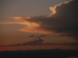 Buy Clouds Fill the Sky at Twilight Over African Plains at AllPosters.com