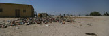 Buy Trash Litters the Ground in Front of a Bar in Namibia at AllPosters.com