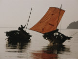 Buy Moken Man Works with Rigging on His Boat Next To Another Boat at AllPosters.com