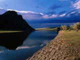 Evening Sky over a Waterside Mountain