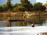 Fishermen Casting Net on River