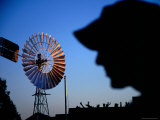 Jolly Swagman Statue Silhouette and Windmill at Waltzing Matilda Centre
