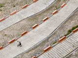 Two Women Walking Along Steep Road Leading Up to Gyantse Dzong, 14th Century Fort Photographic Print