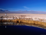 Buy One of the Two Lakes Called the Eyes of the Salar with Mountains in the Background at AllPosters.com