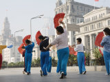 Buy Women Practising Tai Chi with Fans on the Bund at AllPosters.com