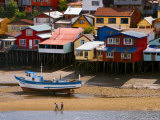Brightly Painted Stilt Houses on Waterfront