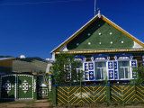 Traditional Painted Cottage in the Picturesque Village of Baikalskoe Photographic Print