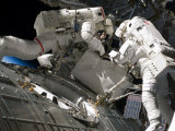 Buy Astronauts Participating in Extravehicular Activity During STS-124 at AllPosters.com