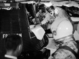 Buy John Glenn Checking Out Mercury Capsule That Will Launch Alan Shepard into Space at AllPosters.com