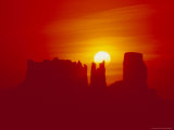 Buy Land Formations and Red Sky, Navajo Reservation, Monument Valley Tribal Park, Arizona, USA at AllPosters.com
