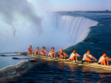 Rowers Hang Over the Edge at Niagra Falls, US-Canada Border