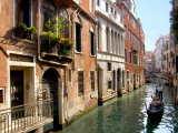 Gondolas along Canal, Venice, Italy