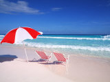 Lounge Chairs and Umbrella on the Beach