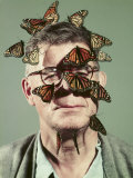 Butterfly Breeder Carl Anderson with Monarch Butterflies on His Face
