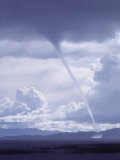 Large White Fluffy Clouds and Funnel Cloud During Tornado in Andean Highlands, Bolivia