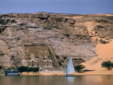 Boats on Nile River Passing Massive Statues of Pharoh Ramses II at Door to Queen Nefertari's Temple
