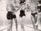 Underwater Shot of Actress Daphne Dayle in Topless, One Piece Swim Suit by Designer Ruben Torres