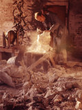 Metal Worker William Underhill of Brooklyn, Chips the Plaster from Bronze Casting of Container Form
