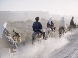 Russian Look of the Land Essay: Donkeys Carring Moslem Peasants on Dusty Road