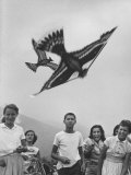 Children Playing with Various Flying Toys