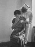 Nurse Trying to Comfort an Elderly Patient