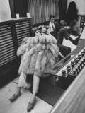 Singer Barbra Streisand in Silver Fox Fur Coat, Listening Intently to Playback of Her Recordings