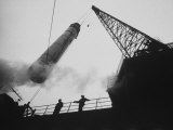 Encased Missile Being Loaded Aboard a Polaris Sub