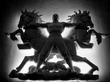 Buy Statue of Man and Horses Being Lit from Behind at the New York World's Fair at AllPosters.com