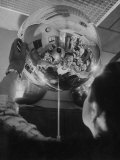 Buy Scientist Alexander Simkovich Working on a Us Artificial Satellite at AllPosters.com