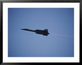 The NASA SR-71 Blackbird flies overhead during an air show