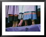 A view of people wearing striped stockings