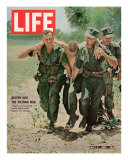 Buy Wounded US Marine Helped to Safety by his Buddies During Fight with Viet Cong, July 2, 1965 at AllPosters.com