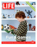 Boy Examining the New Hot Toys of the Season, November 11, 2005 Photographic Print