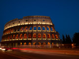 Buy Lights Illuminating from the Historical Coliseum in Rome at Night at AllPosters.com