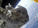 Buy Astronaut Participates in Extravehicular Activity on the International Space Station at AllPosters.com