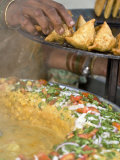 Woman Arranging Freshly Cooked Samosas, Market, Darjeeling, West Bengal, India