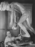 Sculptor John Hope Modeling Figure of Polynesian Pearl Diver, American Museum of Natural History