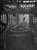 Shipbuilding, 10,000 Ton Merchantman Frames on Overhead Trolley Crane Dropping Plate into Position