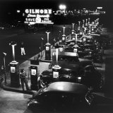Buy Gilmore Gas Station Featuring Eight Islands, Three Pumps Each, Girl Makes Change Every Two Islands at AllPosters.com