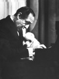 Portrait of Pianist Vladimir Horowitz at Piano with Poodle, Return to New York Concert Stage