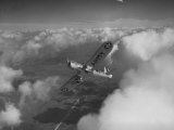 US Army's Ryan, Dragonfly, YO-51 Observation Plane Soaring Above the Clouds