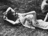 Buy Young Couple Relaxing During Woodstock Music Festival at AllPosters.com