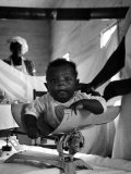 Nurse-Midwife Maude Callen Weighing Baby on Scale Premium Photographic Print