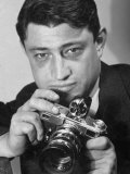 Portrait of Life Photographer Carl Mydans with Camera in Hand