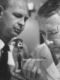 Buy US Navy Beischer and Dr. Stullken Taking Temperature of Monkey Who Survived Trip into Space at AllPosters.com