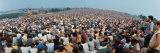 Seated Crowd Listening to Musicians Perform at Woodstock Music Festival