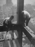 Workmen Attaching Steel Beams High Above Street During Construction of Manhattan Company Building