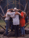 Young People Huddled Together in Front of Swing at a Playground, Woodstock Music and Art Fair